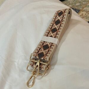 ah-dorned purse strap